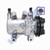 Automotive air conditioning compressor with drive pulley on the right; inset highlights the clutch area framed in blue.