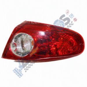 Red car tail light assembly with a clear reverse-light section, shown from a side angle
