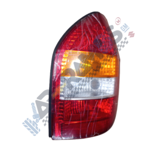 Car tail light with red brake section, amber turn signal, and clear reverse light.