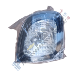 Automotive headlight assembly in clear packaging, showing a clear lens and reflective interior