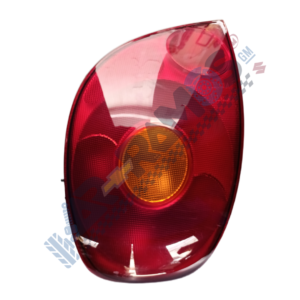 Rear car taillight assembly with red lens and a central amber/orange reflector light.
