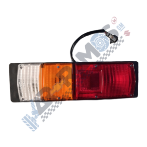 Designer Automotive tail light assembly with clear, amber, and red lenses and a wiring connector attached to a black backing plate.