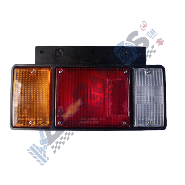 Three-section vehicle tail light: amber left indicator, red center brake light, and clear right reverse light.