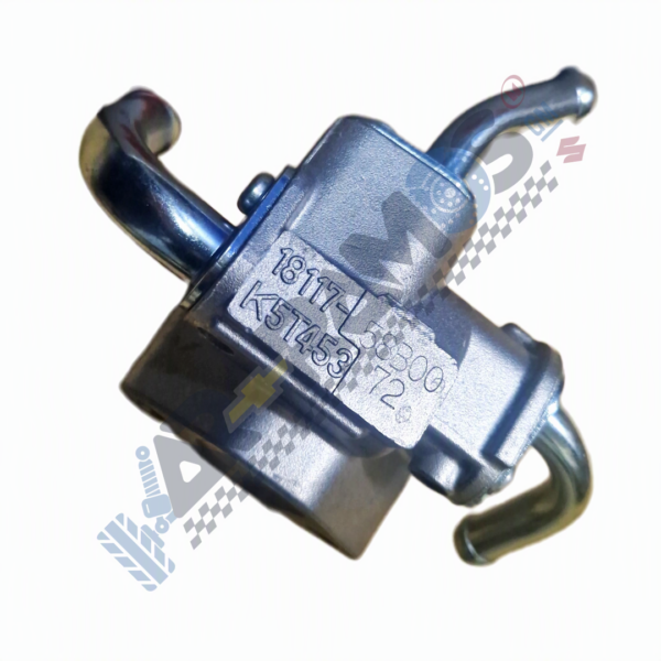 Close-up of a small metallic automotive valve or connector with two curved inlet/outlet tubes and stamped part numbers (showing 18 1171, K5T453).
